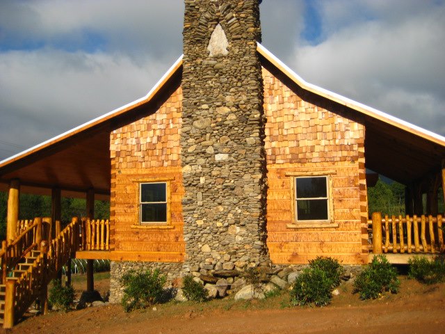 Hand hewed 6 x 12 log home with dovetail corners in the mountains of NC.