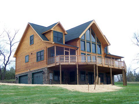 Custom log home using 8" tall x 6" wide D logs with dovetail corners.