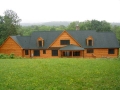 Custom Log home and log siding in the gable ends.