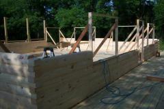 54-8x6-round-flat-d-logs-dovetail-corner-under-construction