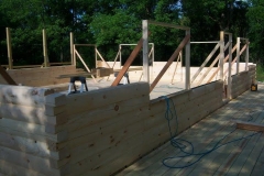 54-8x6-round-flat-d-logs-dovetail-corner-under-construction