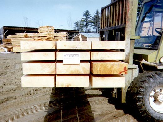 Planed heavy timbers for log cabins and homes.